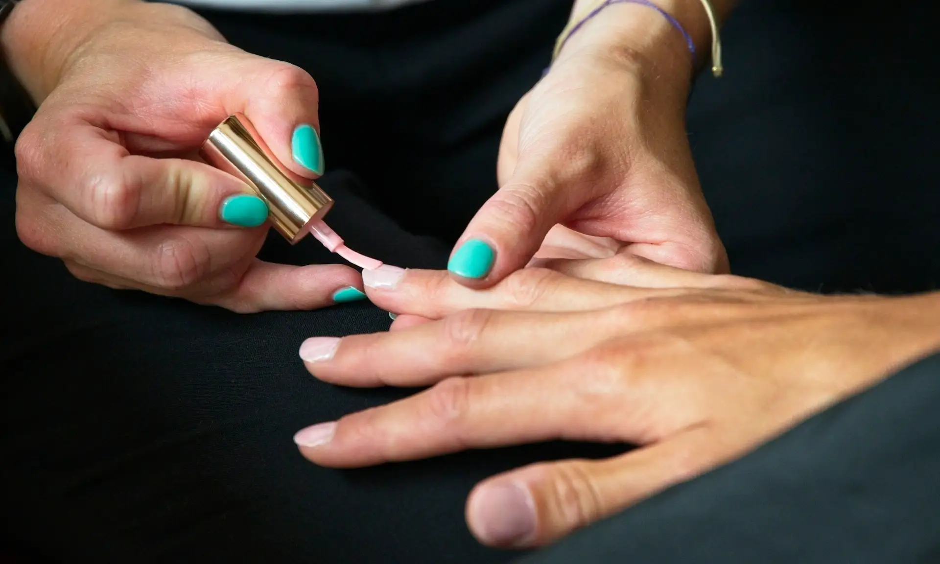 Nail polish being applied to a client's nails Beauty by Ana St Albans