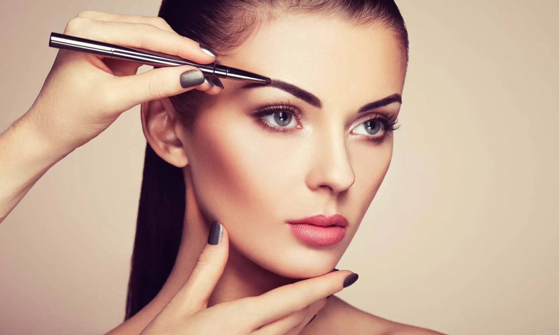 Woman having her eyebrows shaped and defined Beauty by Ana St Albans