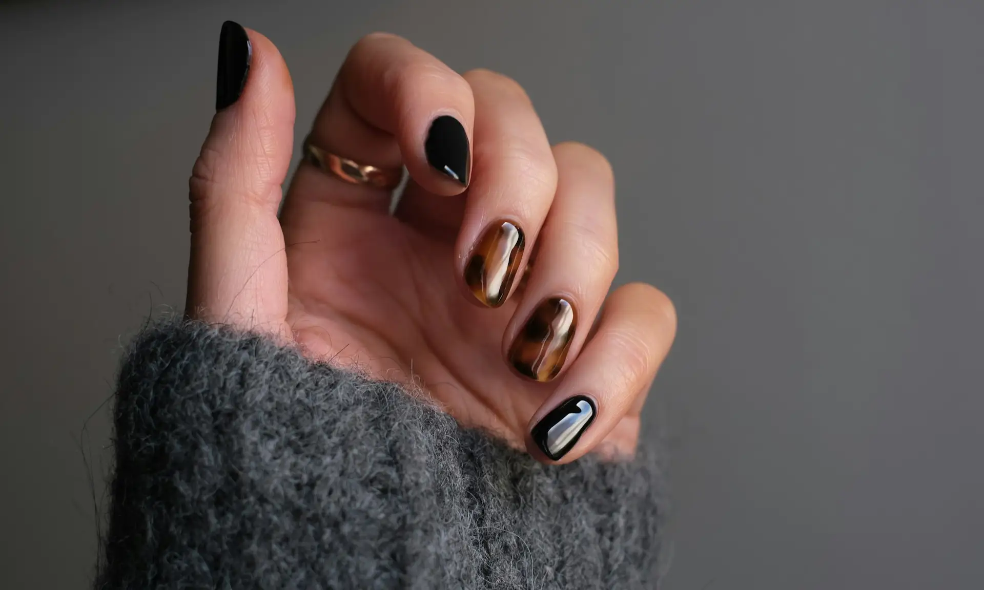 Glossy black manicure with silver rings Beauty by Ana St Albans